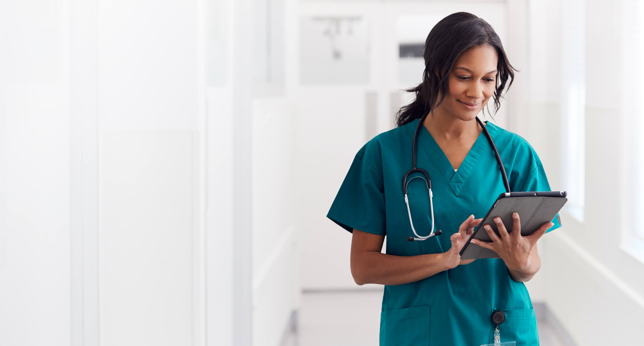 Medical student holding a tablet